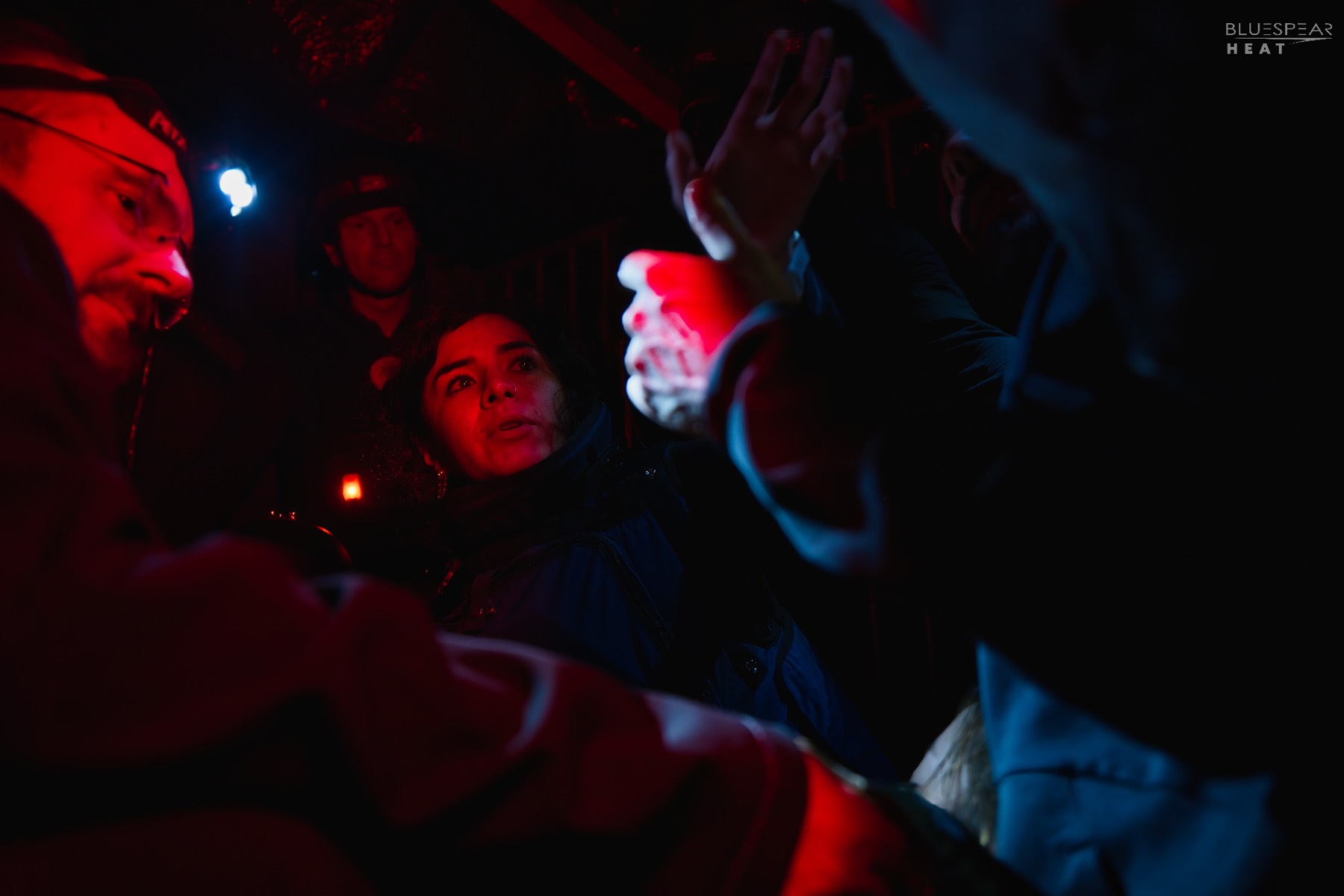 Low-light field briefing with red light