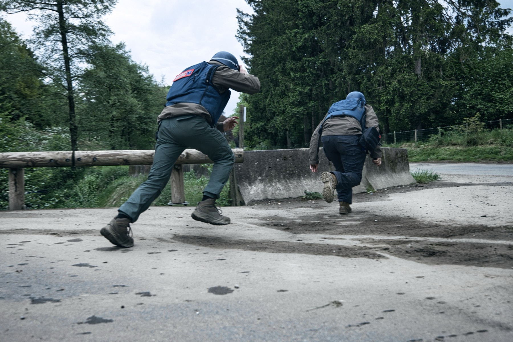 Tactical movement past concrete barrier